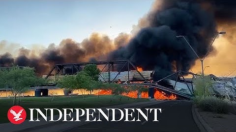 Massive fire in Arizona sparked by derailed train