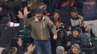 MIA@SF: Fan makes a nice grab on a foul ball