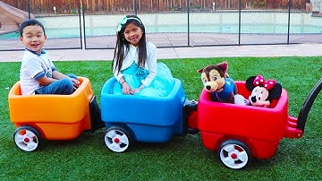 Emma and Lyndon are Having Fun with Step 2 Wagon Toy