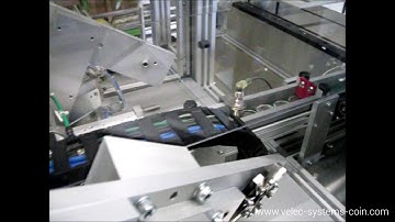Automatic packaging machine to pack collector coins into capsules | VELEC Systems coin