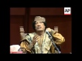 Gadhafi continues visit, meets invited women