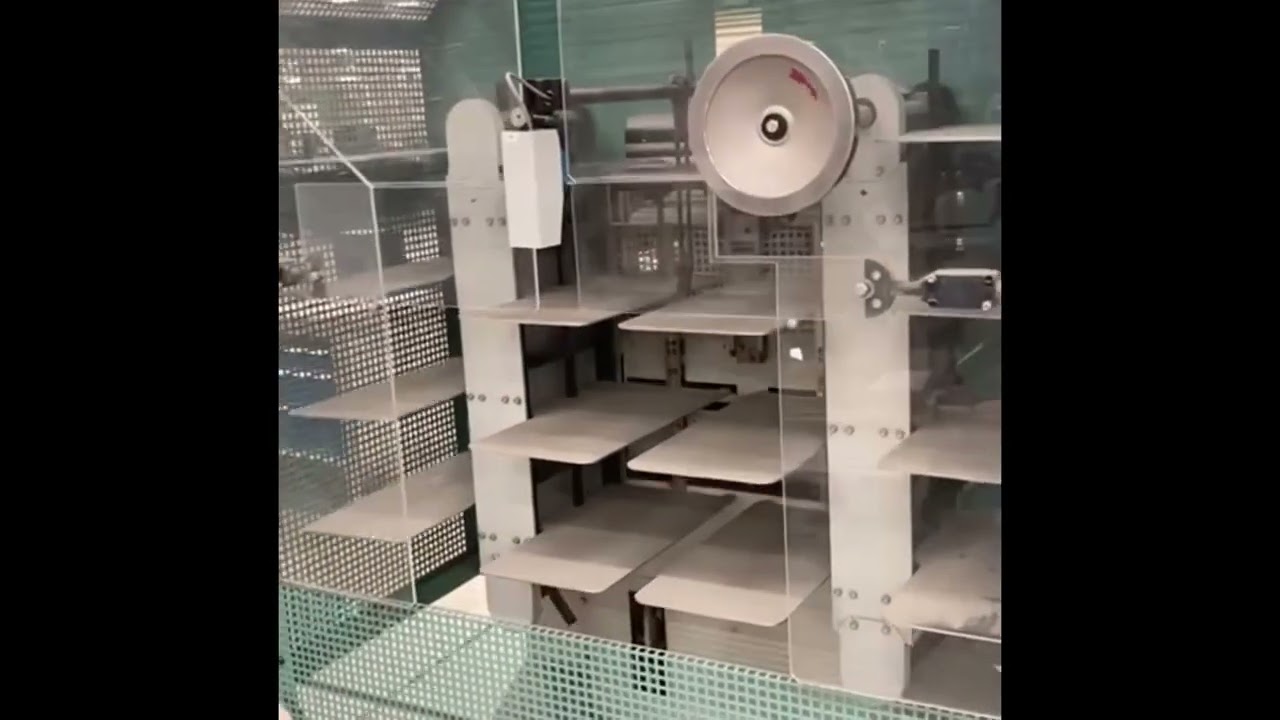 KUGLER- WOMAKO 341-2R punching/perforating machine