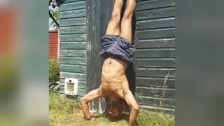 Strict Handstand press ups feat. Harbir Singh