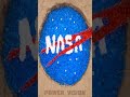 NASA logo with Coca Cola, Mentos and orbeez underground