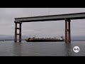 First vessel passes through temporary channel in Baltimore after bridge collapse | VOA News