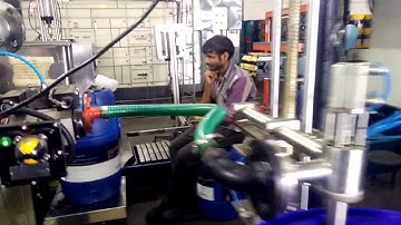 Drum filling machine by Precision sensors and Systems