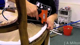 Attaching flanged edge roll to a chair