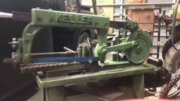 Vintage KELLER power hacksaw working.