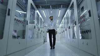 Electrical Worker Walking Down The Hall Stock Video