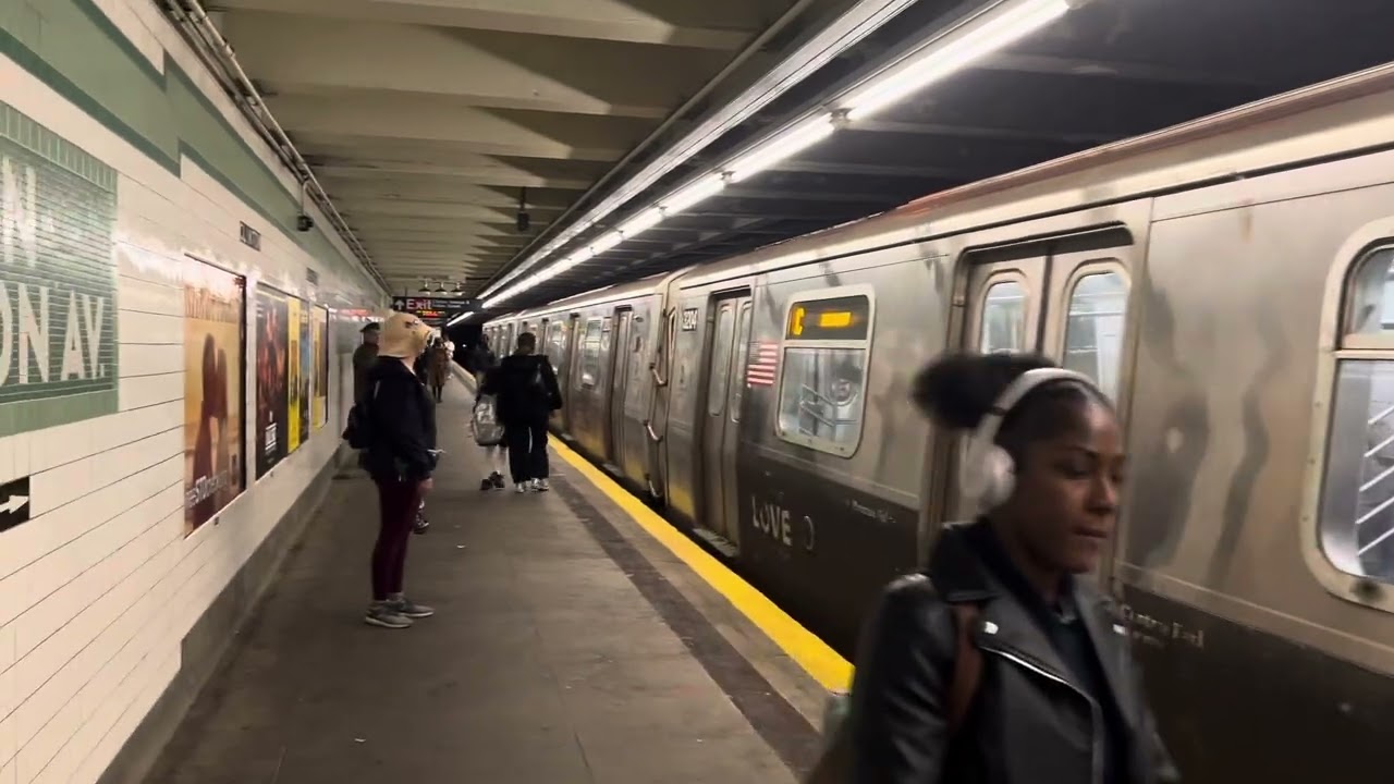 R179 & R211A (C) trains entering and leaving Clinton–Washington Avenues, in Brooklyn. 