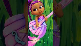 Marisols Mermaid Shell Guitar