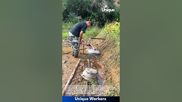 Diy water pump: using pots and bamboo in a muddy field