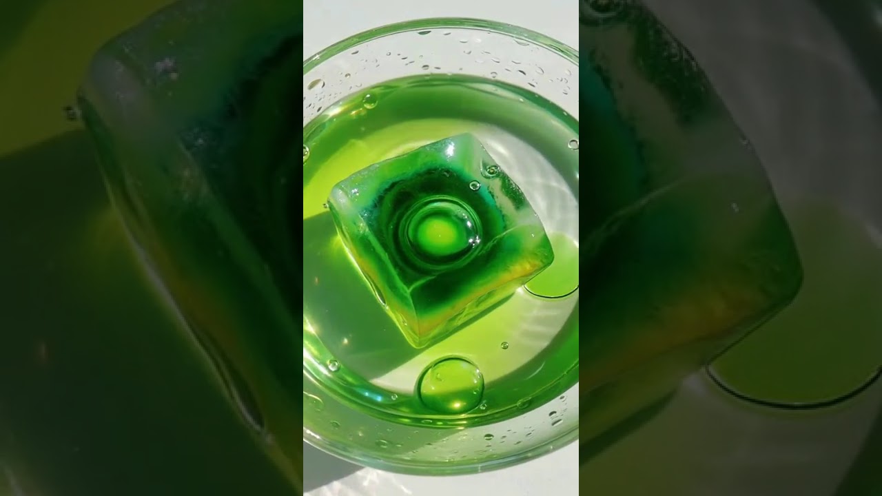 Color-changing ice cubes being melted in warm water.