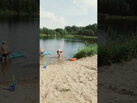 vacationers on the beach in summer