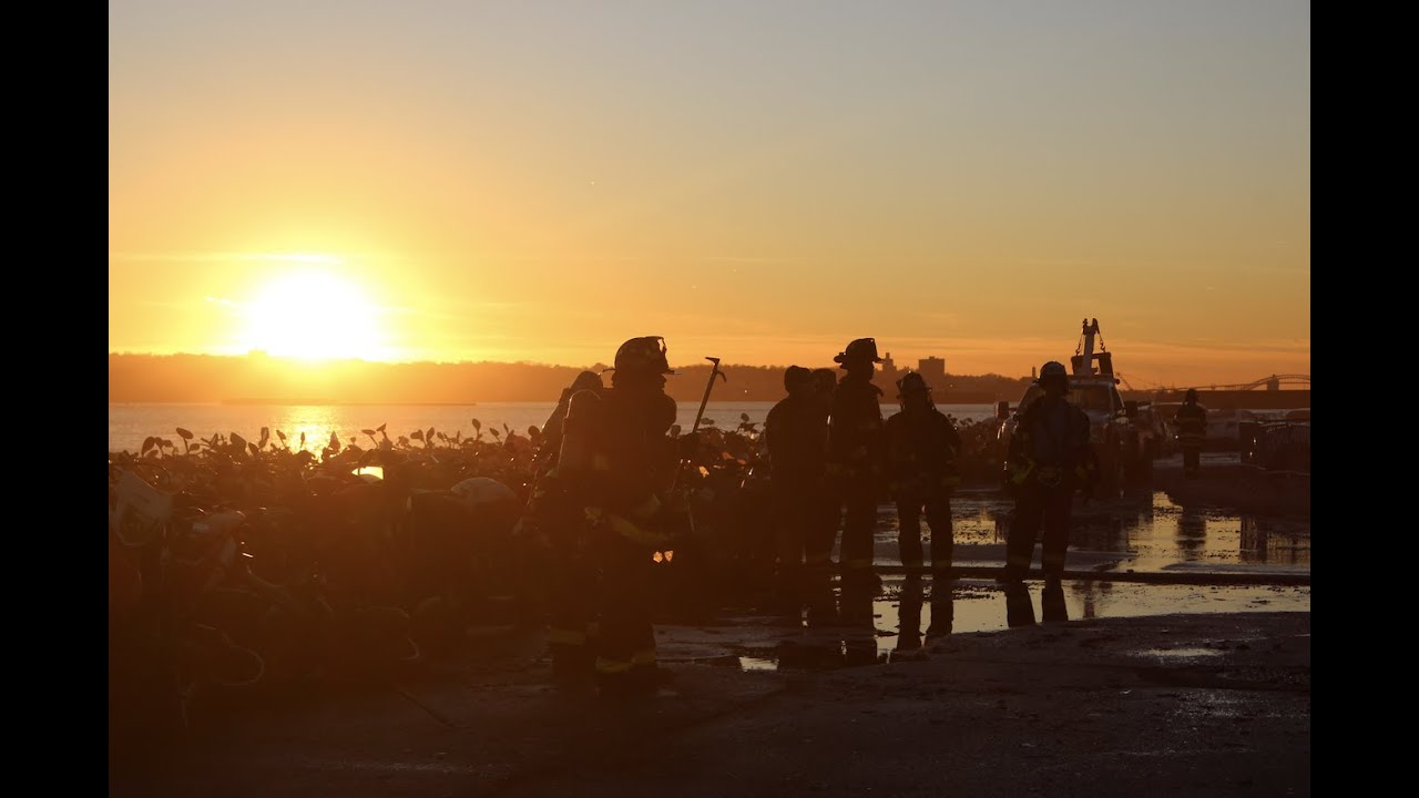 NYPD Warehouse Burns Off The Coast Of Red Hook, Brooklyn