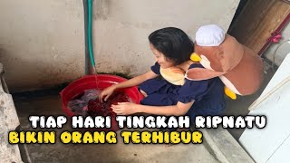 Funnywashing Clothes While Carrying A Child