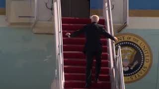 President Biden trips boarding Air Force One