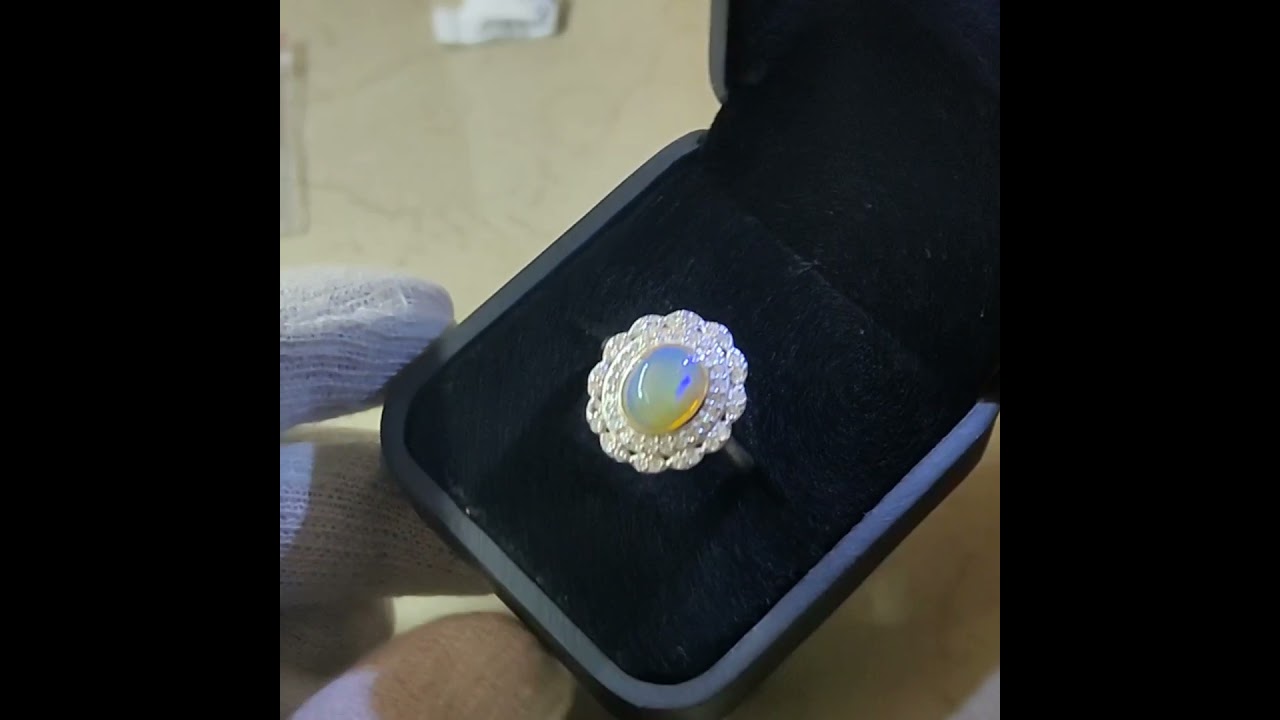 Natural Ethiopian Opal Ring in Pure Silver Metal, Zircons on Sides