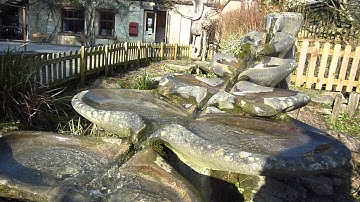 Sevenfold (side view) - Flowform Cascade water sculpture/ water feature at Ruskin Mill