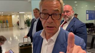 ‘Go away’: Nigel Farage snaps at reporter in fiery airport confrontation