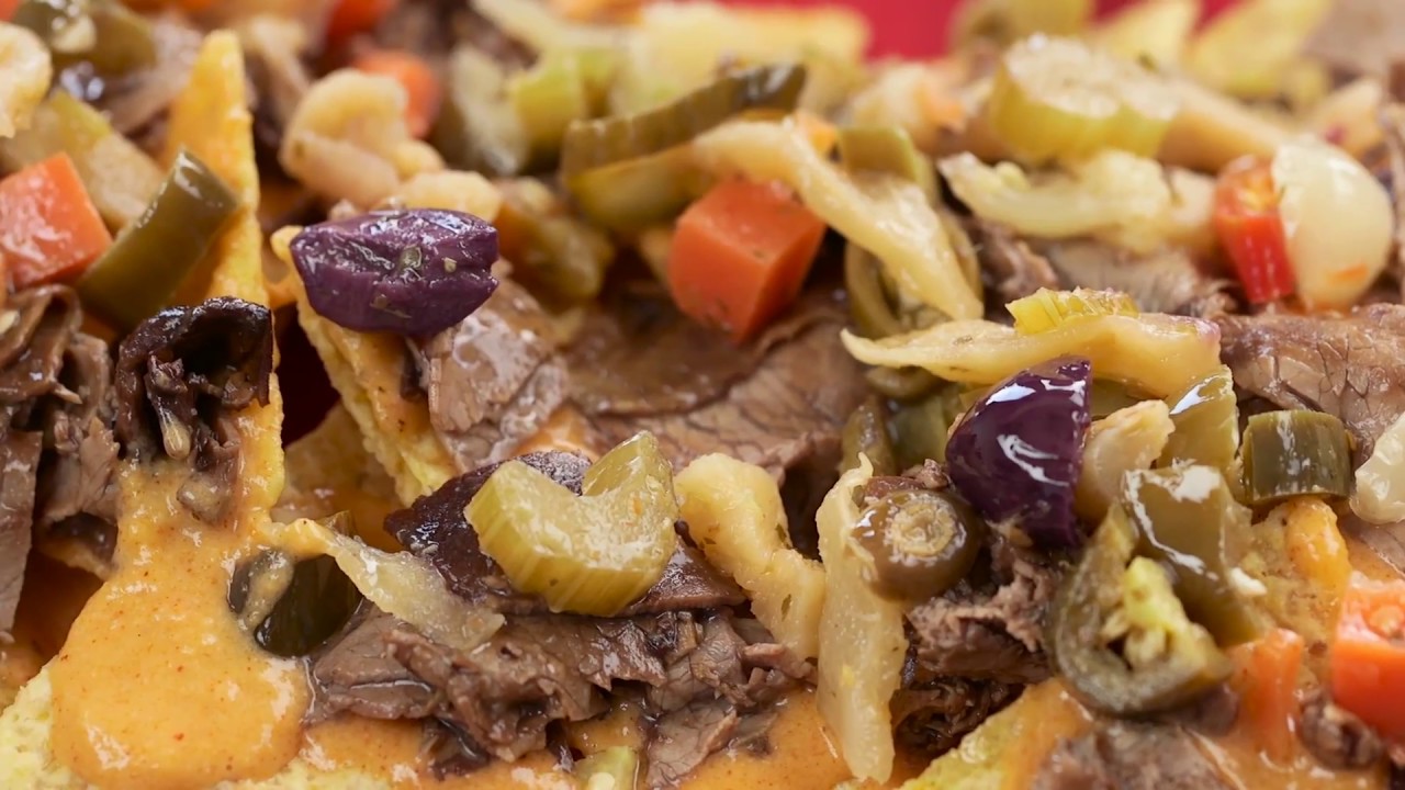 How to Make Spicy Italian Beef Nachos at Home - Spicy and cheesy, prepare to chow down on these loaded nachos.
