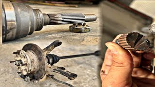 Mechanic repairs broken CV joint axle on front wheel of car \ CV joint teeth machined on lathe