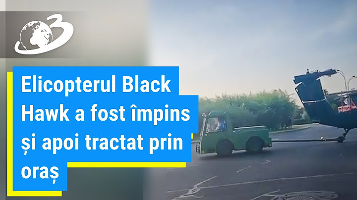 Elicopterul Black Hawk, împins de militarii români și tractat prin Capitală