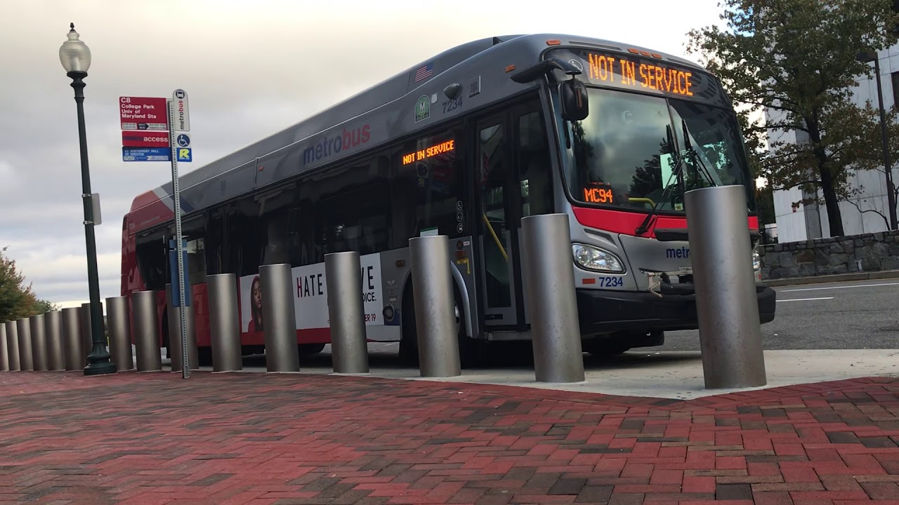 WMATA Metrobus parked at White Flint Station at C8 Bus Stop - YouTube