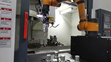 AUBO Robotics Robot machine tending solution with DH-Robotics Grippers.