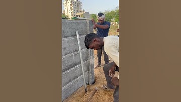 Cement compound readymade boundary wall column is erected by labour in this manner#compoundwall