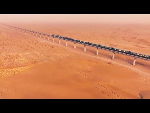 World's first desert-circling railway brings vitality to Xinjiang