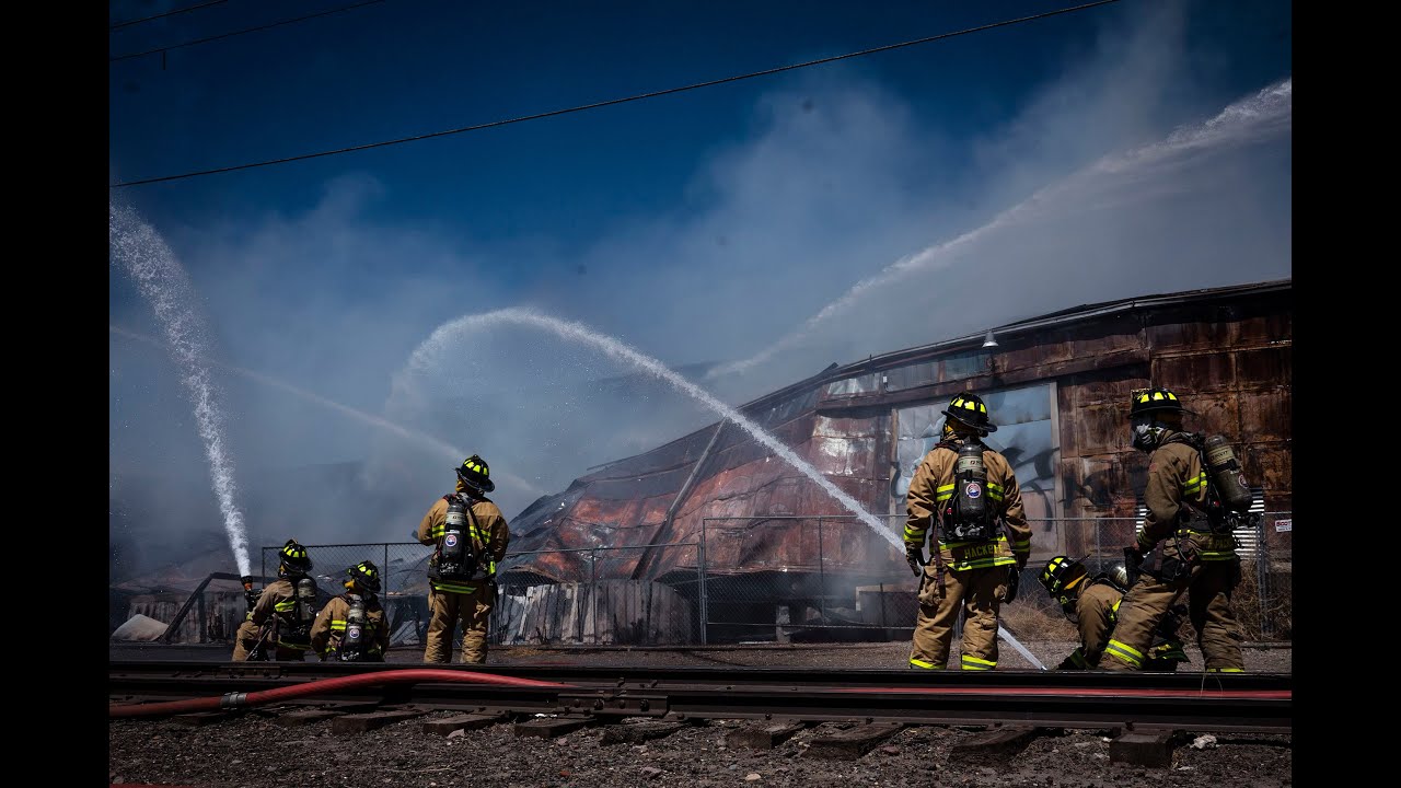 Crews knock down structure fire at Sixth and Haines NW - YouTube