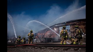 Crews knock down structure fire at Sixth and Haines NW