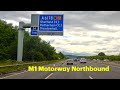 Driving northbound on the M1 Motorway on a cloudy afternoon in 4K