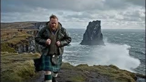 Scotsman Walking Wearing Kilt Near Hoo Stack On Winter History Visit To Shetland Islands Scotland