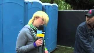 Man washes hands in urinal