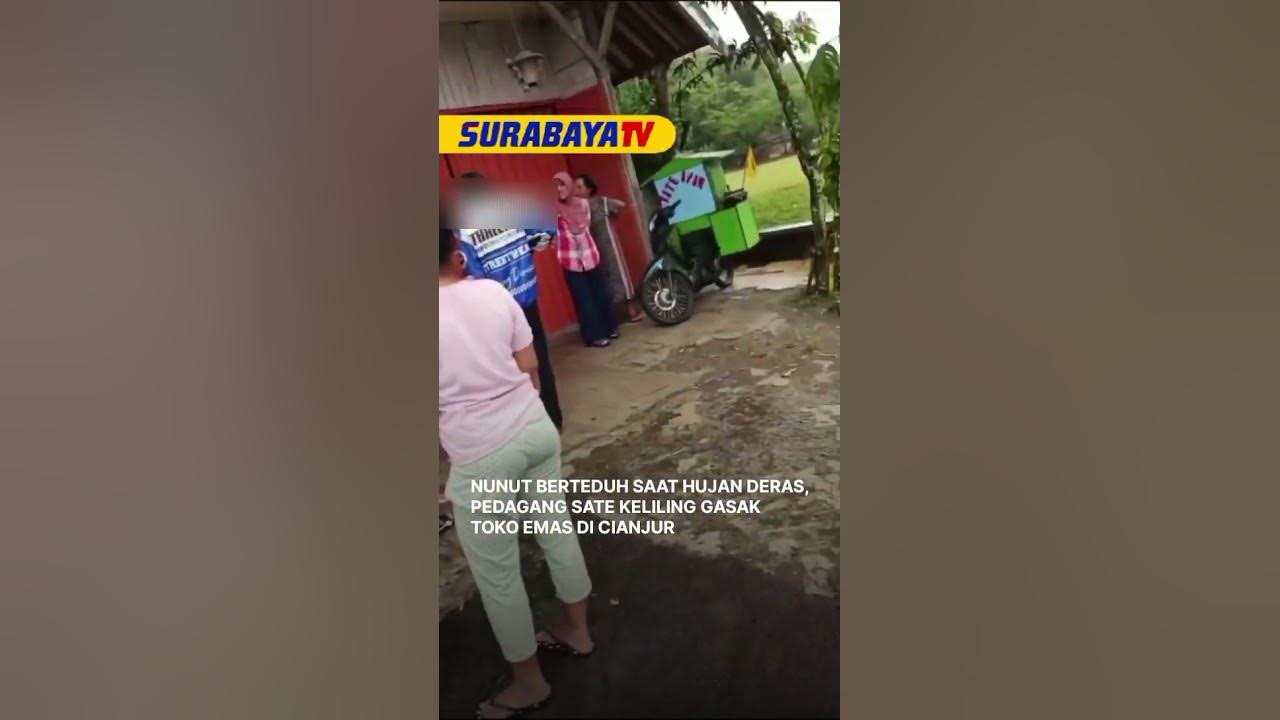 NUNUT BERTEDUH SAAT HUJAN DERAS, PEDAGANG SATE KELILING GASAK TOKO EMAS DI CIANJUR #surabayatv
