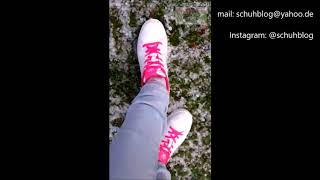 Julie White And Pink Sneaker On A Rainy Day