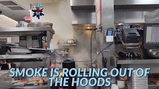 SMOKE IS ROLLING OUT OF THE HOODS