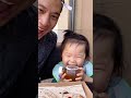 Baby confused by bottle that sounds like an apple #shorts