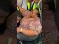 Woman being helped to disembark from the plane#news
