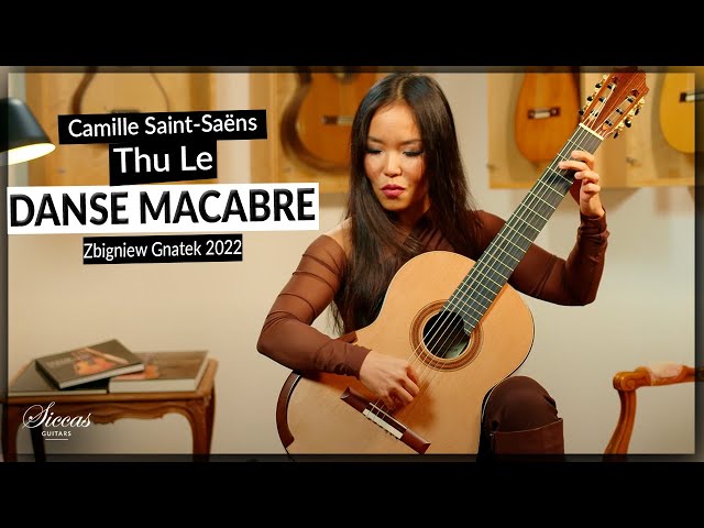 Thu Le plays Danse Macabre by Camille Saint-Saëns 🤩 on a 2022 Zbigniew Gnatek Guitar class=