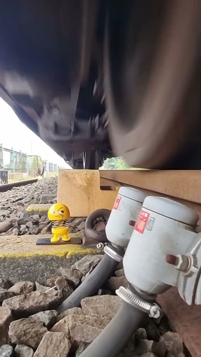 Emoticon doll beside the railroad tracks!! 🙃🙃  #shorts