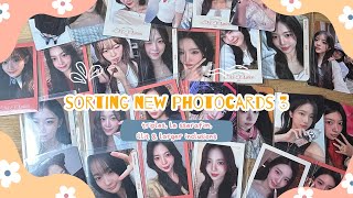 Sorting photocards #3 ~ triples, le sserafim, and illit
