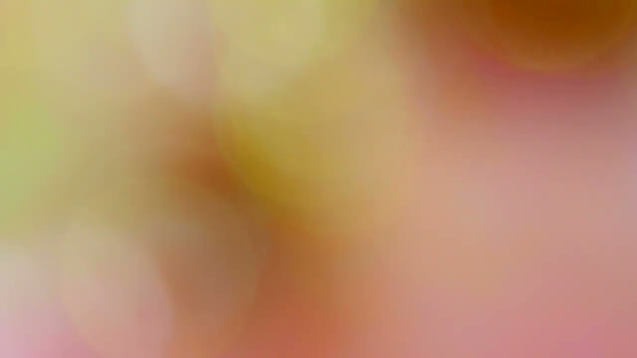 Soft peach bronze and yellow bokeh abstract background