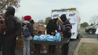 Newburg families line up for free turkey at giveaway