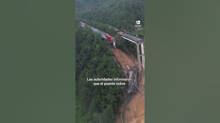 Conductor queda colgando con su camión tras el derrumbe de un puente