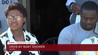 Family of new parents throws surprise drive-by baby shower