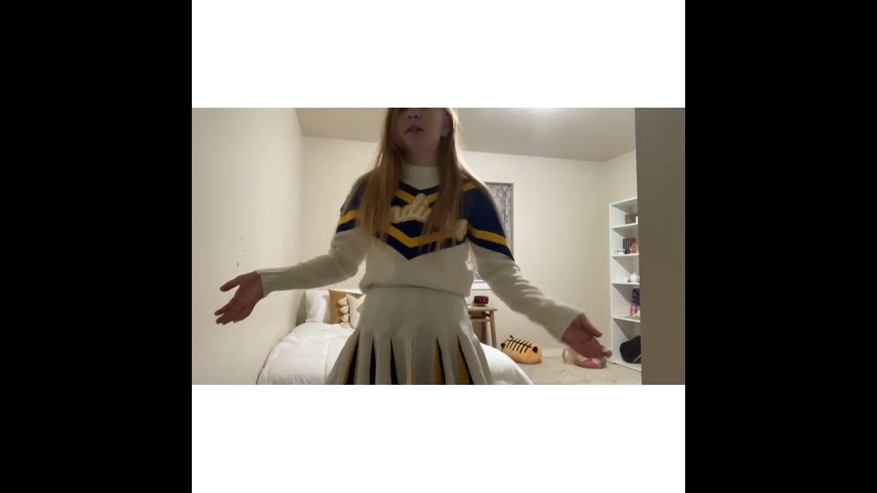 Trying on my moms old cheer uniforms