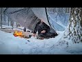 Snow storm camping overnight in a tarp shelter on a mountain  appalachians